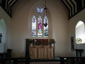 Looking to the apse and altar at St Martha's church in Albury, Surrey. 2009.