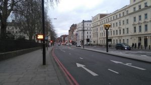 Looking north on Vauxhall Bridge Road in Pimlico London, with traffic camera visible in the foreground.