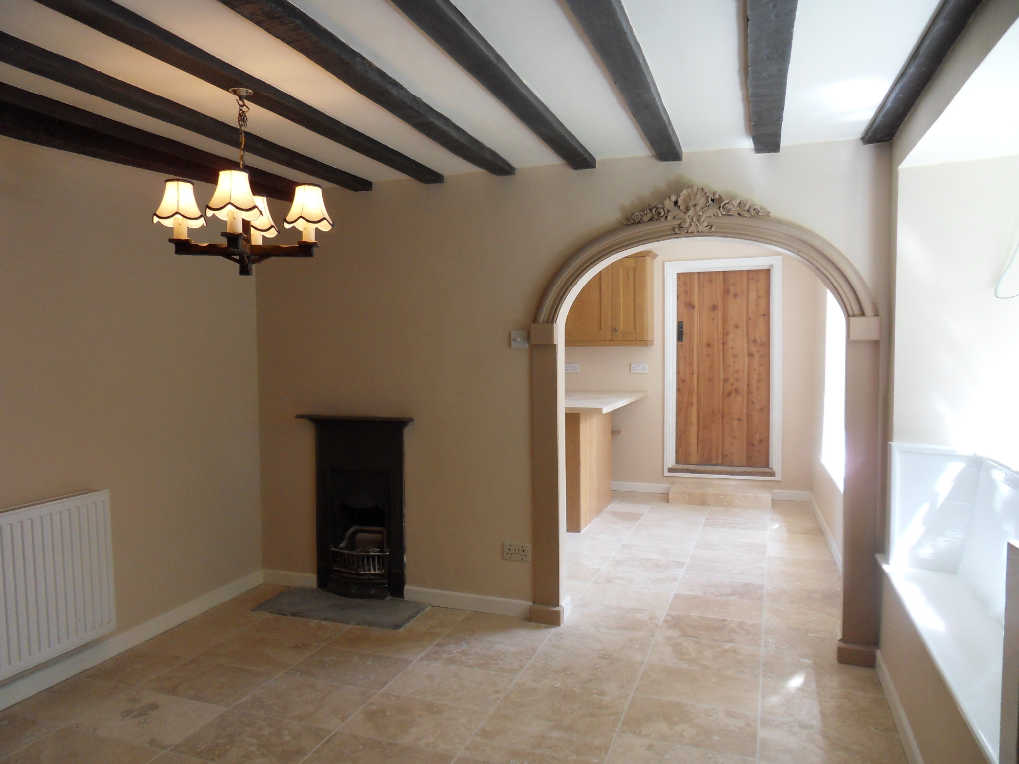 Internal archway and fireplace
