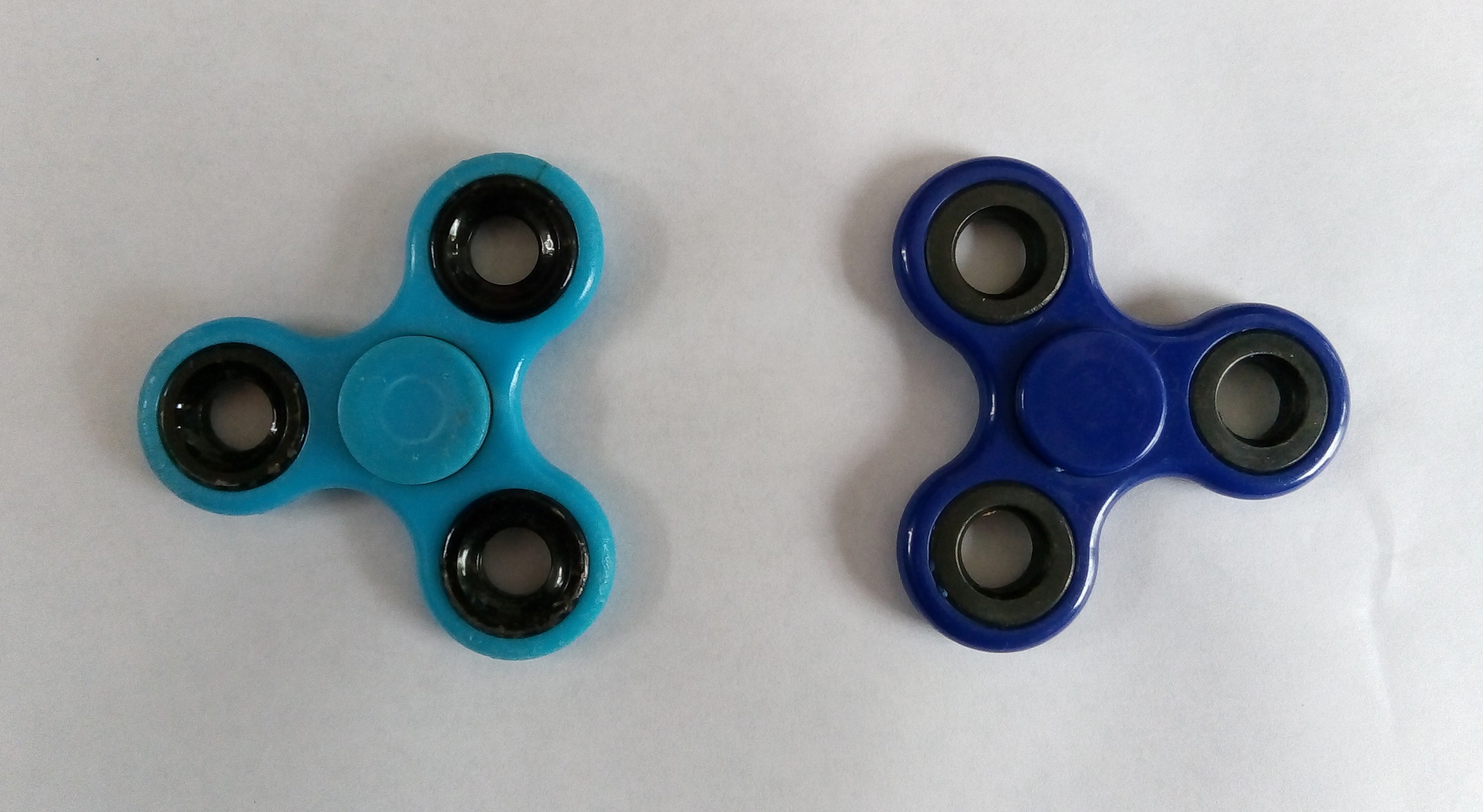 Blue fidget spinners stationary